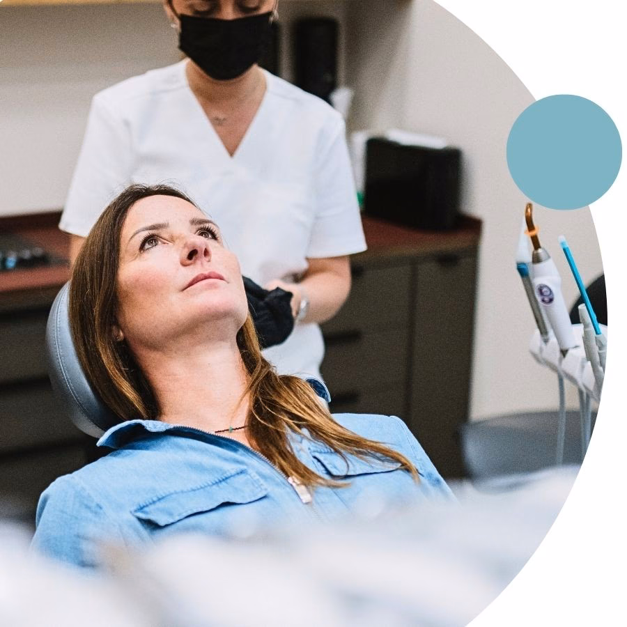 A patient in the dental chair during treatment at Flow Dental Studio